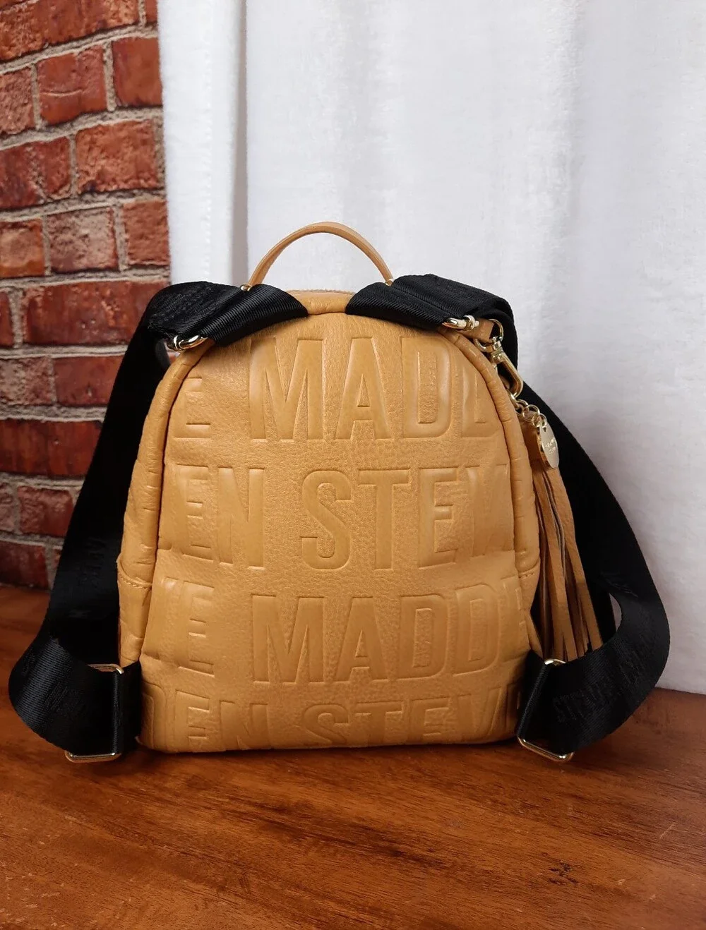 Steve Madden Mustard Mini Tassel Backpack